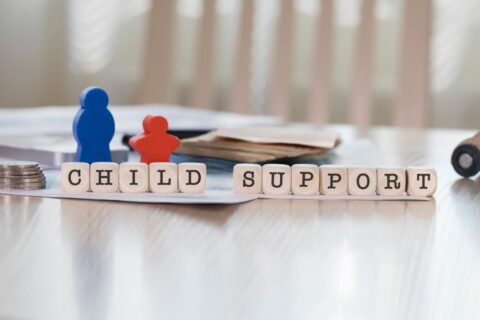 A block of letters spelling out child support.