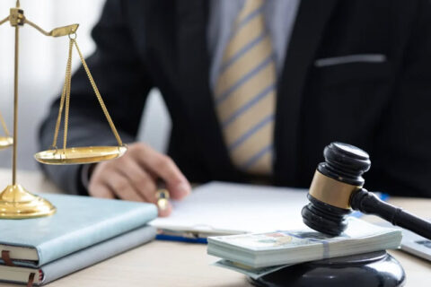 Business valuation division case in Tucson AZ with attorney reviewing financial and legal documents